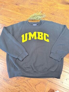 MV Sport Black Crewneck Sweatshirt with Yellow UMBC Logo